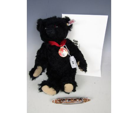 A Steiff 2012 Titanic Centenary Bear, No. 663888, 26 cm, with model of the Titanic, box and certificate of authenticity