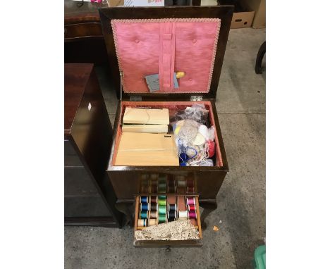 A vintage sewing box and contents 