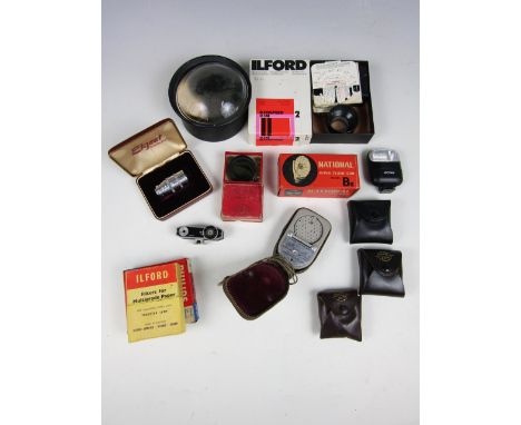 A quantity of vintage camera accessories including an Elgeet Cine Tel 38 mm F.3.5 lens, boxed, a national Hyper flash gun mod