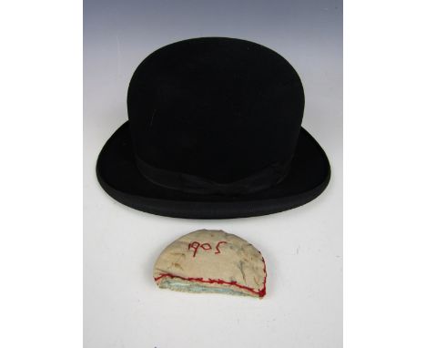A gentleman's vintage bowler hat, together with an Edwardian handmade egg cosy, with embroidered decoration including the dat