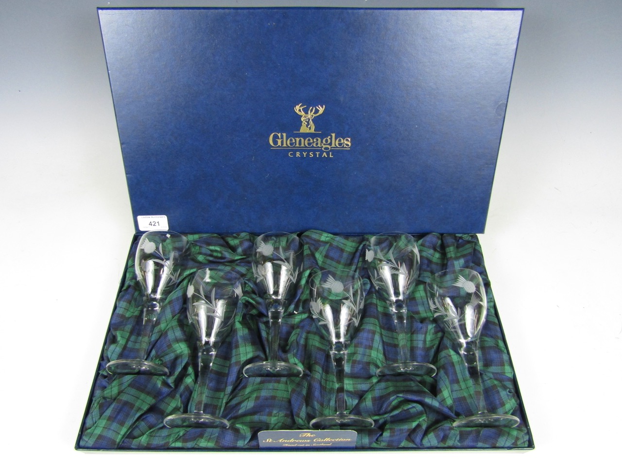 A cased set of six Gleneagles crystal wine glasses