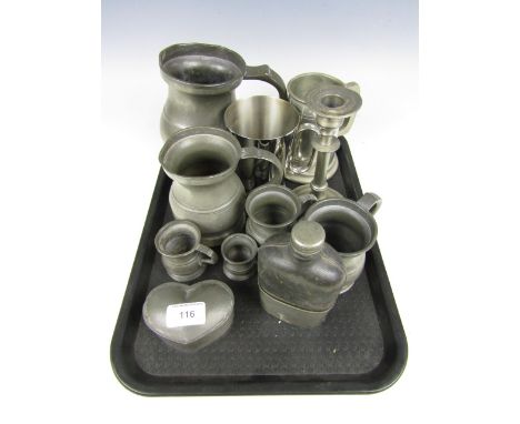 A quantity of 19th century and later pewter measures and tankards together with a pewter heart form trinket box, flask and ca