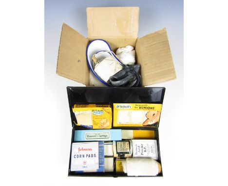 A vintage Boots first aid tin with contents together with quantity of vintage bandages and enamelled trays
