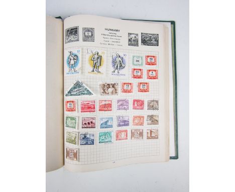 A vintage Stanley Gibbons Swiftsure stamp album containing sundry foreign stamps