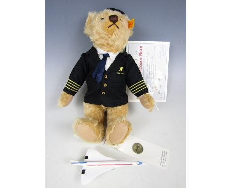 A Steiff Concorde Bear, serial number 0163, with model of Concorde, box and certificate of authenticity 
