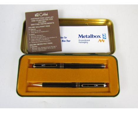 A vintage Christmas special edition Colibri pen and pencil set from Metal Box of Carlisle