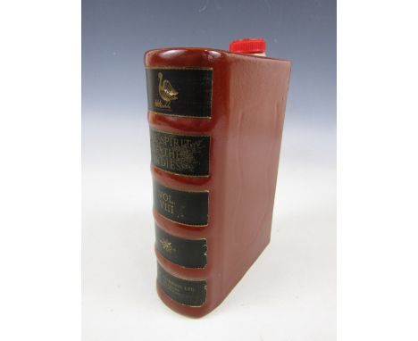 A Govancroft of Glasgow ceramic whisky flask for W R Paterson Ltd, modelled as a book