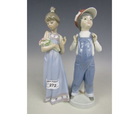 Two Lladro figurines depicting a girl with flowers and a boy with an accordion