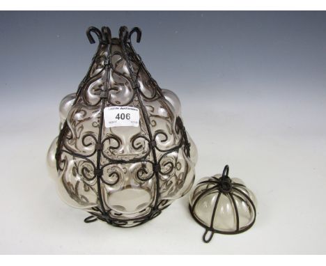 A pendant glass ceiling light shade