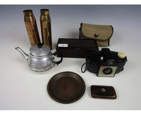 Sundry collectors' items including a 1951 Festival of Britain teapot, a pair of shell cases, a Bakelite cigarette box, a Koda
