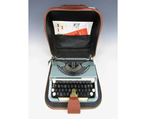 A cased vintage Imperial Good Companion typewriter