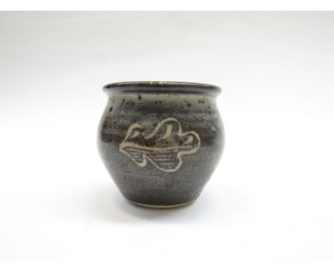 A Leach Pottery St Ives pot with ash glaze, oak leaf design. Pottery seal only. 8.5cm high 