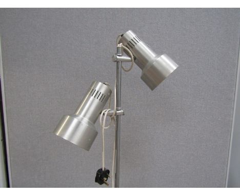 An Aluminium standard lamp with twin adjustable spots. 