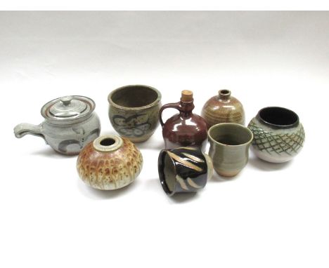 A collection of Studio Pottery to include Leach Pottery and Mashiko Yunomi, Mick Casson lidded soup pot, Winchcombe oil bottl