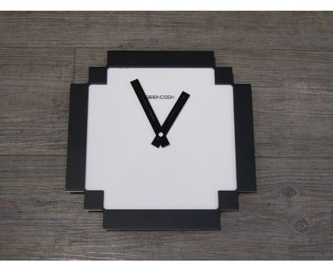 A GeekCook black and white wall clock, 30cm diameter 