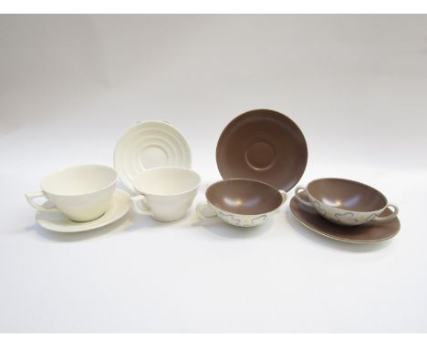 A pair of Keith Murray Moonstone cups and saucers for Wedgwood (hairline to one cup) together with a pair of Poole contempary