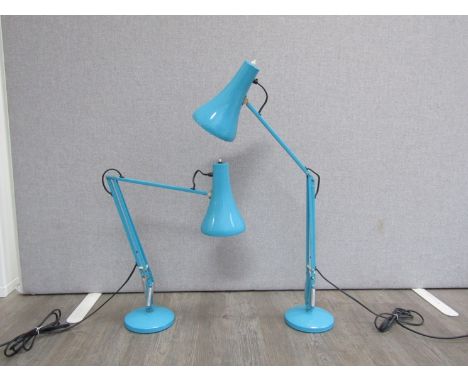 A pair of Anglepoise desk lamps in turquoise colour by Herbert Terry. 