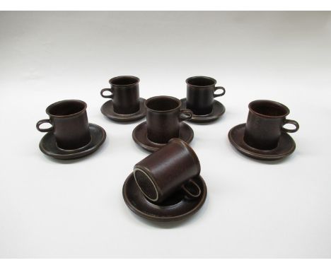 An Arabia brown glazed set of six coffee cans and saucers 