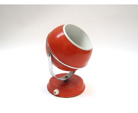 A 1960's wall mounting globe light with adjustable orange spot