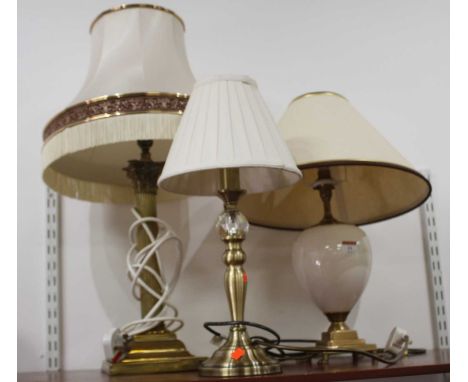 A 20th century brass table lamp in the form of a Corinthian column, h.67cm (including shade); together with two other modern 