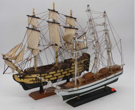 A wooden model of a ship, the Golden Hind, h.44cm; together with one other (2)