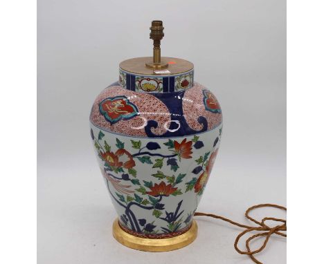 A 20th century Chinese porcelain table lamp, of baluster form, decorated with flowers and ruyi heads, h.52cm 