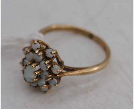 A 9ct gold opal flowerhead cluster ring, 2.5g, size M/N