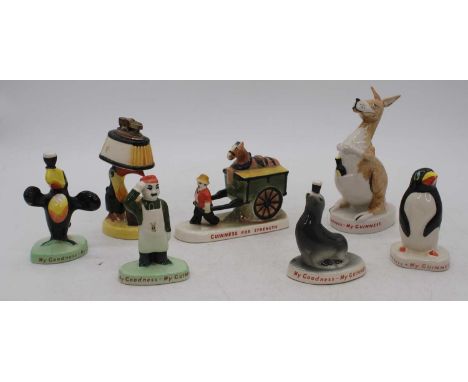 A collection of Guinness advertising figures, to include Carltonware