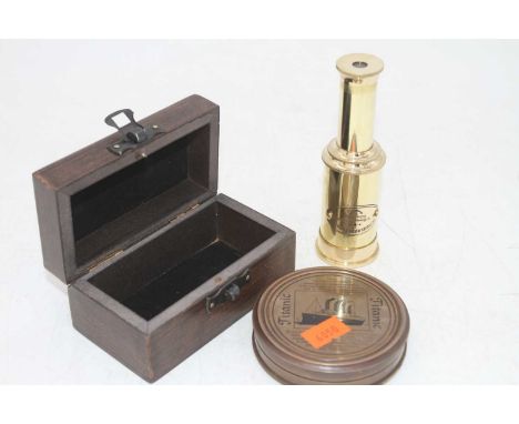 A reproduction HMS Titanic compass; together with a reproduction two-draw monocular telescope