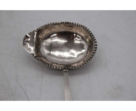 A Georgian silver toddy ladle, having ebonised handle, marks rubbed, 37cm 