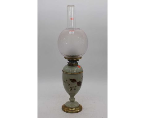 A Victorian green glass oil lamp, the acid etched shade above a floral decorated body, h.55cm 