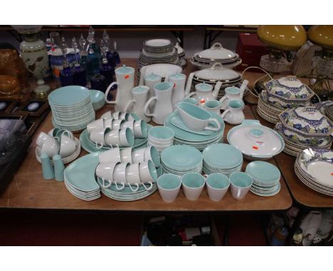An extensive Poole Pottery turquoise and white tea, coffee and dinner service