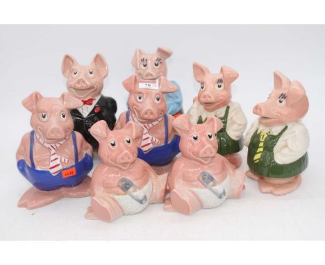 A set of eight Wade Natwest piggy-banks, the largest h.20cm 