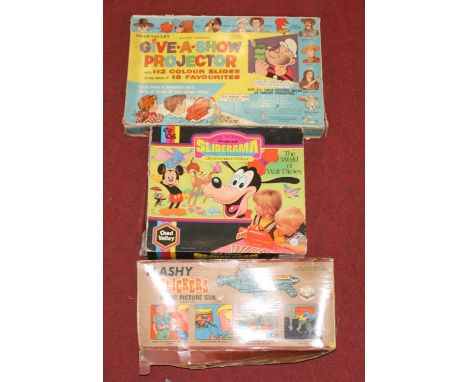 A collection of vintage children's toys, to include a Walt Disney Slide-O-Rama, a Flashy Flickers Magic Picture Gun, and a Gi