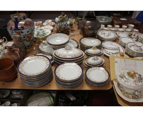 A Royal Worcester dinner service, decorated with floral swags 