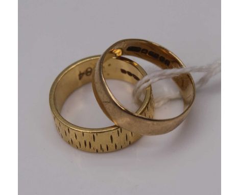 An 18ct gold wedding band, having textured decoration, 5.4g, size K; together with a 9ct gold plain wedding band, 2g (2)
