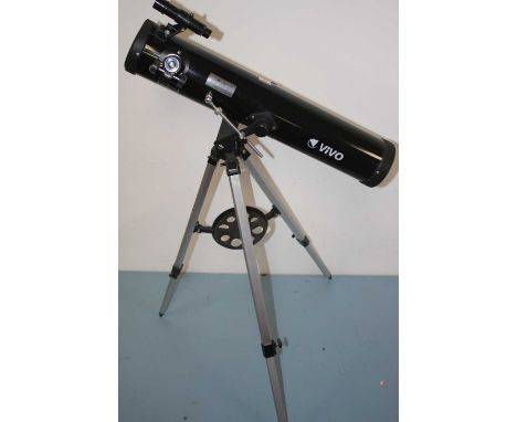 A Vivo telescope, mounted upon a tripod and with additional lenses 