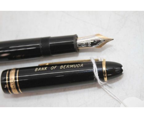 A Montblanc Meisterstuck 4810 fountain pen, in black with gold trim and snow-cap logo to to cap, with original 14k Medium nib