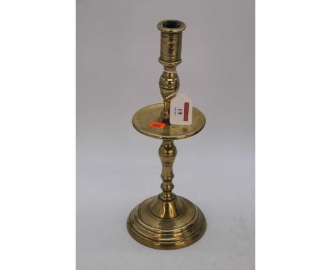 An 18th century Heemskerk style brass candlestick, h.34cm