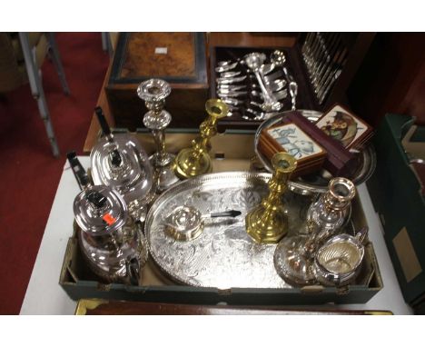 Metalware to include a silver plated tea and coffee service and a pair of Victorian brass table candlesticks 