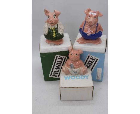 A set of three Wade Natwest piggy-banks, the largest h.17cm