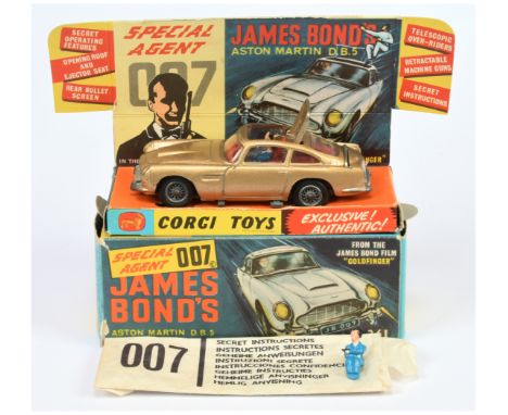 Corgi Toys 261 "James Bond" Aston Martin DB5 From The Film "Goldfinger" - Gold body, red interior, wire wheels with "Bond &am