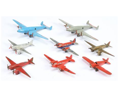 Dinky Toys a group of 8 Aircraft to include - 60K Light Tourer - Red, 62R Albatross Mid-blue, red flashes - plus others condi