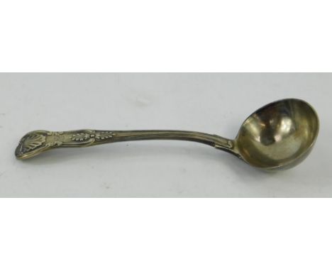 A Victorian silver cream ladle decorated in the Kings pattern, crest engraved, London 1872, 2.69oz