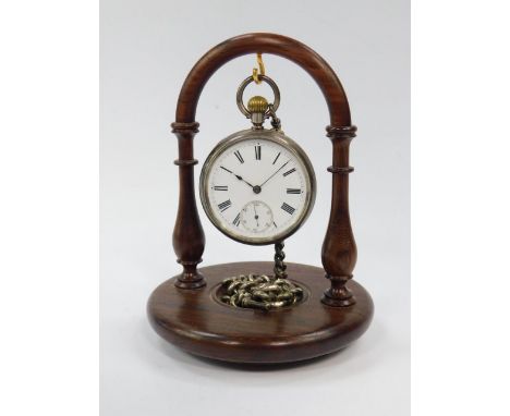 A Victorian gentleman's silver pocket watch, open faced, key less wind, white enamel dial bearing Roman numerals, subsidiary 