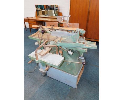 A Poole Wood Equipment spindle moulder, with a planer thicknesser combined, with accessories, on a moveable base. 