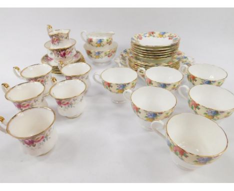 A Royal Albert porcelain part coffee service decorated in the Autumn Rose pattern, comprising cream jug, sugar bowl, five cof