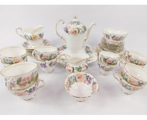 A Paragon porcelain part tea and coffee service decorated in The Country Lane pattern, comprising coffee pot, bread plate, tw