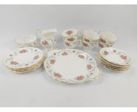 A Royal Albert porcelain part tea service decorated in the Tranquility pattern, comprising bread plate, cream jug, sugar bowl