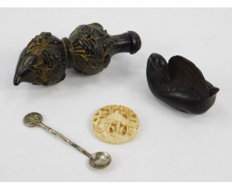 A Chinese 19thC black lacquer snuff bottle and stopper, of gourd form, carved with  birds and water flowers, a Japanese carve